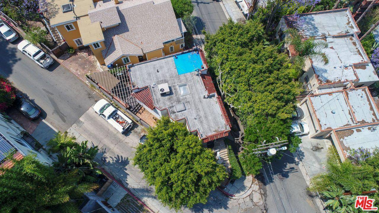 Vacant Mediterranean Duplex in the Hollywood Dell in a great location on a corner triangle lot