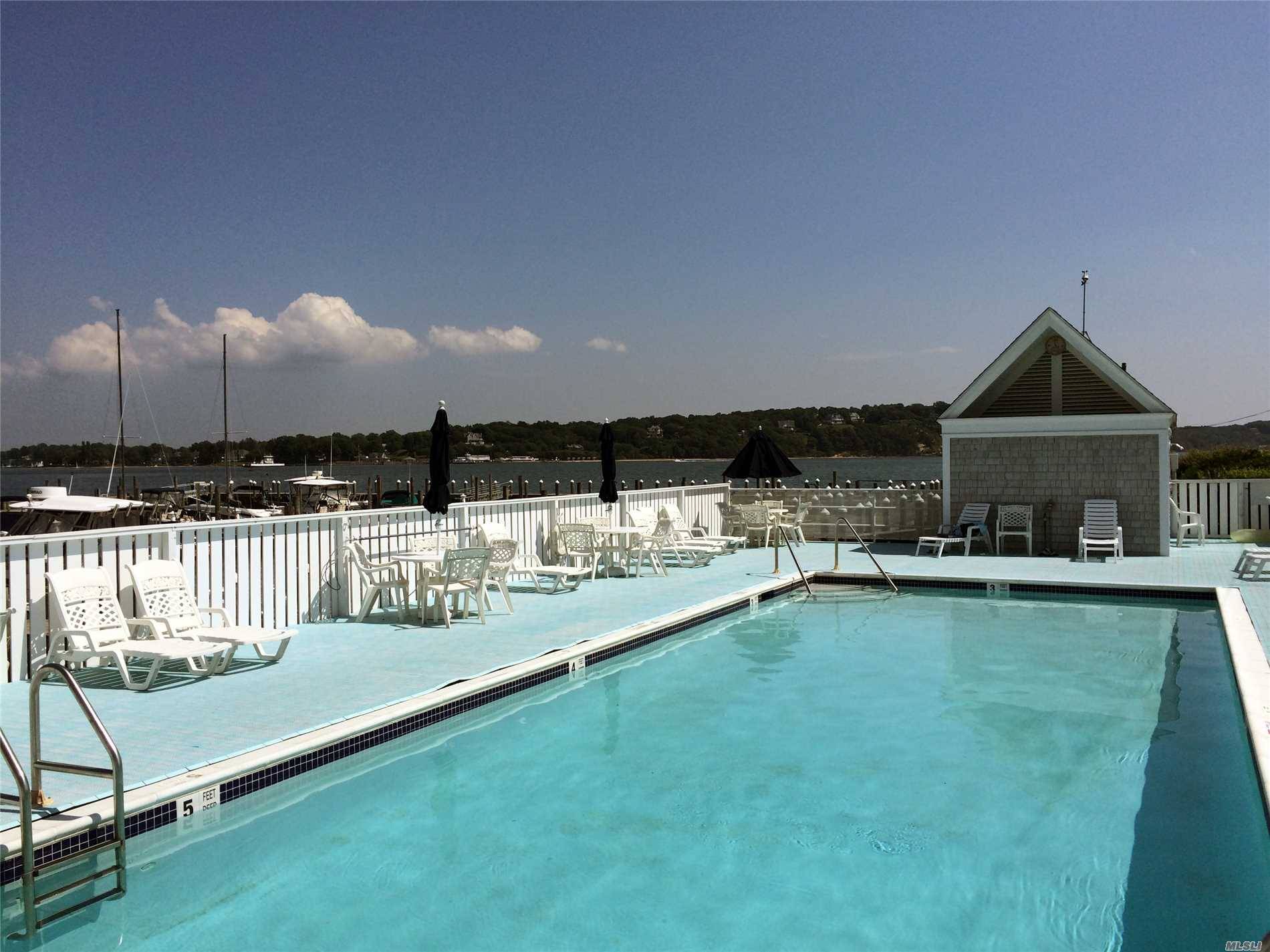 Waterfront Condo On The Bay Close To Greenport Village, Enjoy Boating, Biking, Shops And Restaurants, Pool, Tennis Courts And Boat Slip.