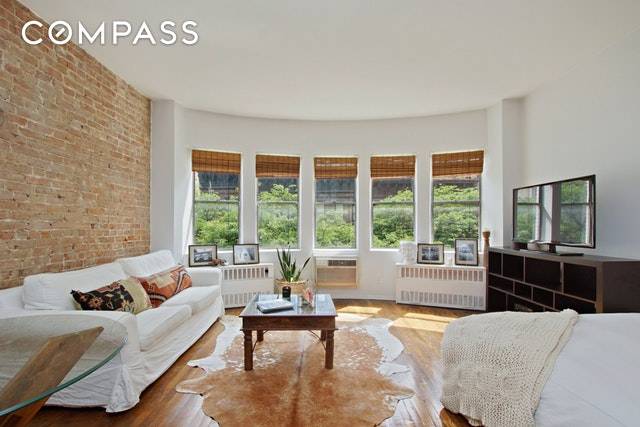 This charming and sun drenched studio, is located on one of the most beautiful and quiet tree lined blocks in the UWS.