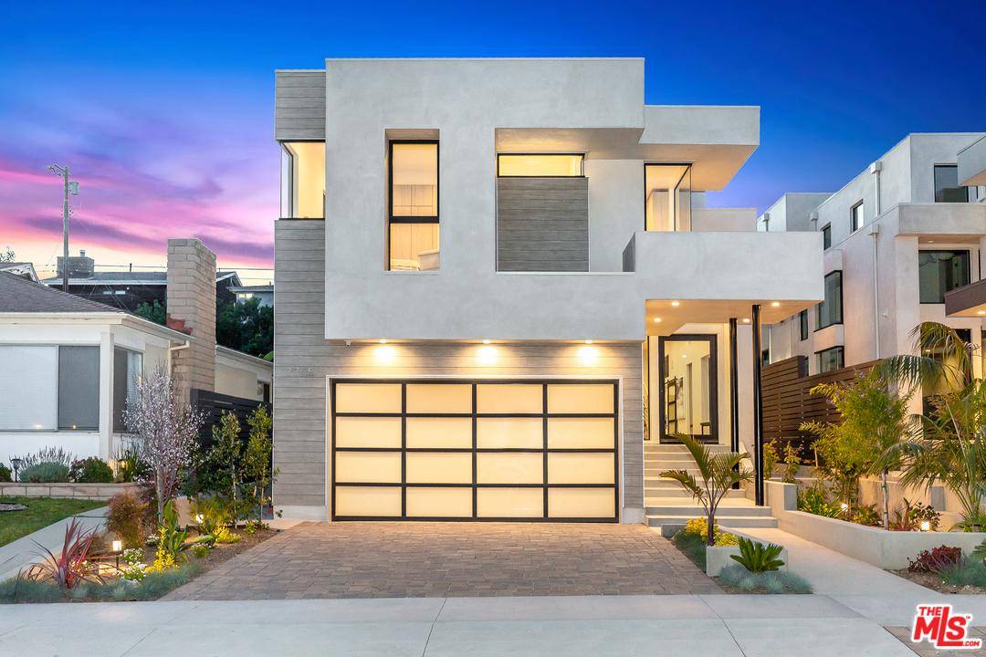 Located on a picturesque tree lined street in Playa Del Rey stands this custom new Architectural triumph