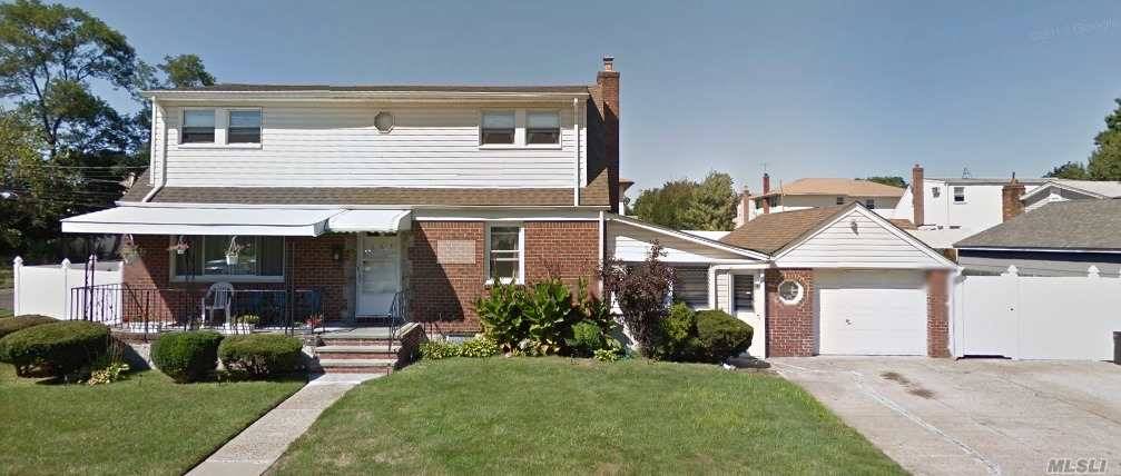 Beautiful Elmont Home Located On A Very Quite Street.