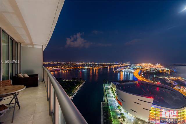 Mesmerizing panoramic views of Downtown Miami and Biscayne Bay greet you in this beautifully renovated high floor condo in Marinablue