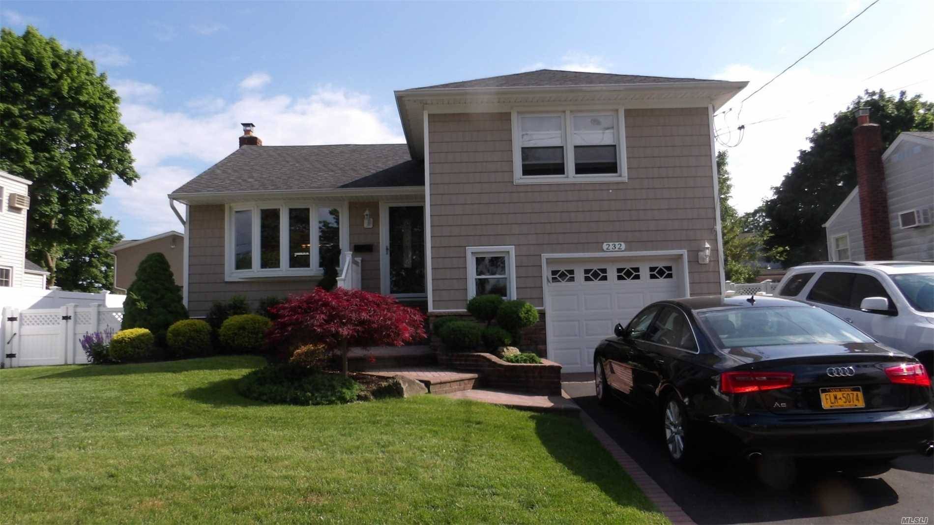 Updated Split In Massapequa Park With Resort Style Yard With In Ground Pool!!!!!