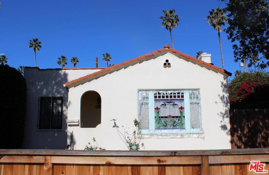 Remodel or add on to this 1926 Spanish style cottage to create your dream home