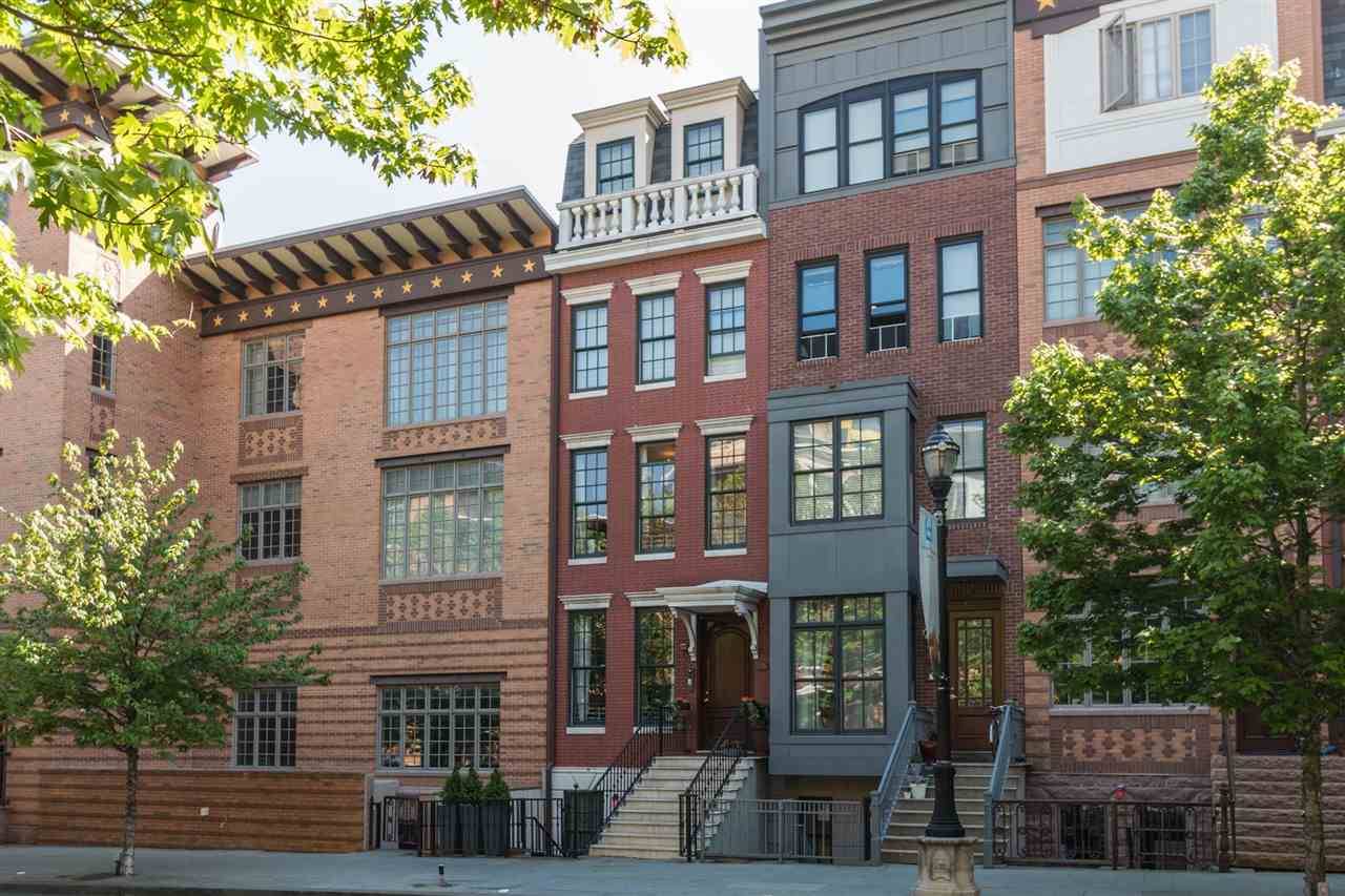Stunning 5-story townhome with top-of-the-line finishes and multiple condo amenities