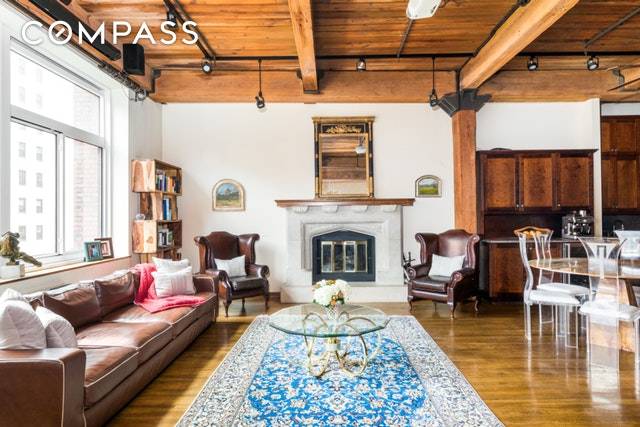 Bathed in sunlight, this one of a kind CONDO loft is situated on a picturesque tree lined block in Gramercy.