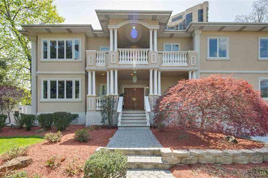 Refined Center-hall Colonial in highly sought after Bluff Section of Fort Lee
