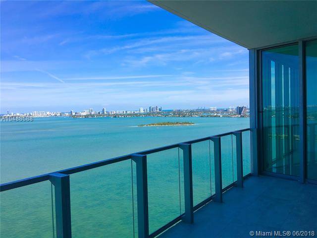 THIS STUNNING UPGRADED 3 BEDROOMS + DEN & 4 BATHROOMS CORNER RESIDENCE AT BISCAYNE BEACH OFFERS BREATH-TAKING VIEWS OF THE ATLANTIC OCEAN