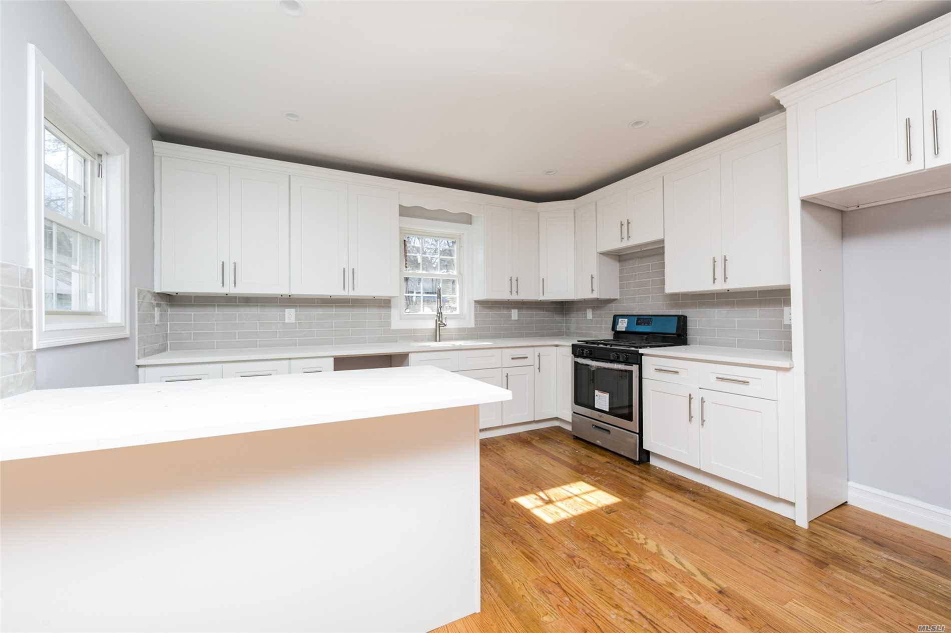 Luxuriously Renovated Move In Ready 1 Family Located On A Beautiful Tree Lined Street Of Ozone Park/ Woodhaven!