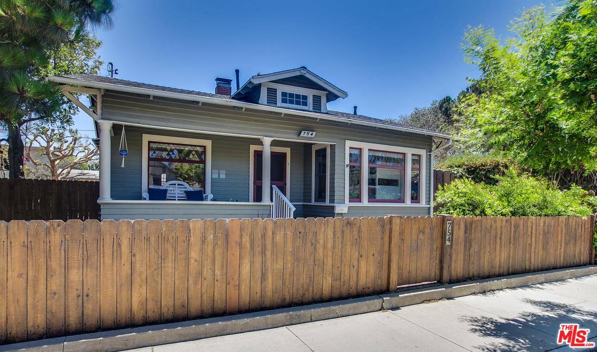 This wonderful updated California Bungalow situated on an oversized lot