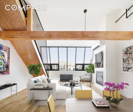 LOFT 520 is a massive 3 Bed, 2 Bath duplex penthouse with a gas fireplace, 18' vaulted ceilings and a sky terrace with direct access to the massive communal roof ...