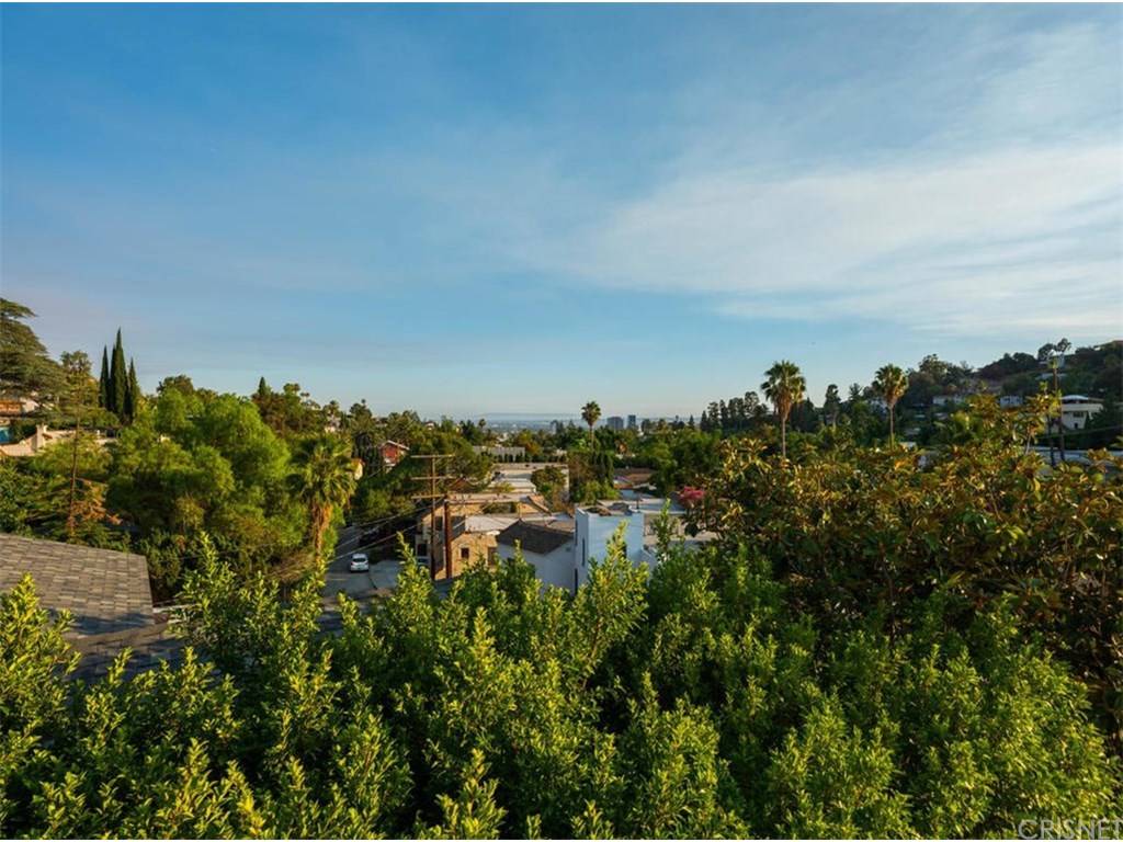Hollywood Hills tri-level with stunning city views in prime Beachwood Canyon location
