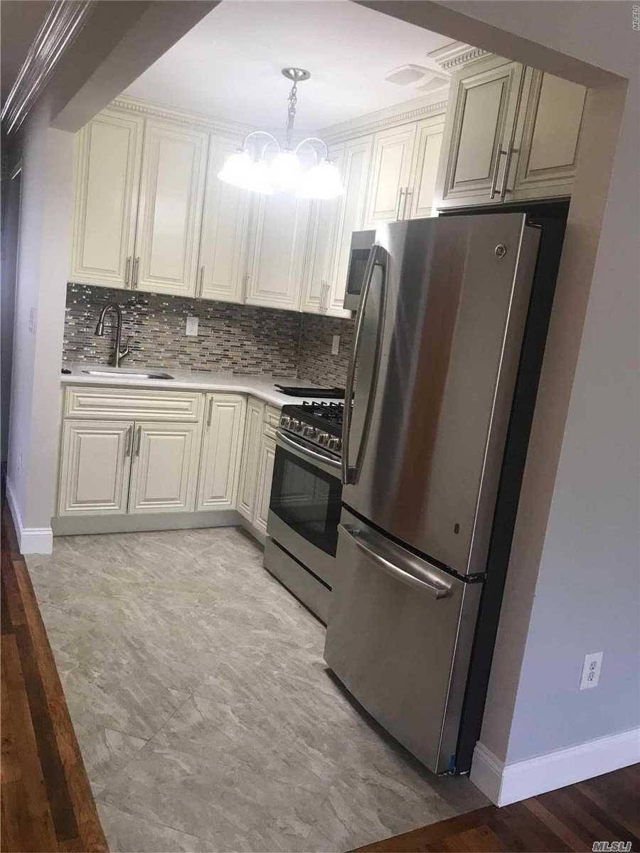 Fully Renovated 3 Bedrooms, 2 Baths 2nd Floor Apartment With Stainless Steel Appliances And Hardwood Floors Throughout.