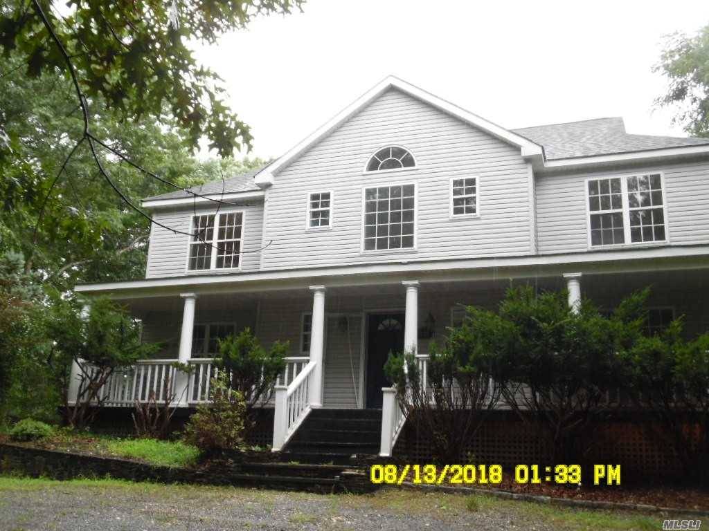 Large Colonial Set On A Large Private 3/4 Acre Lot.
