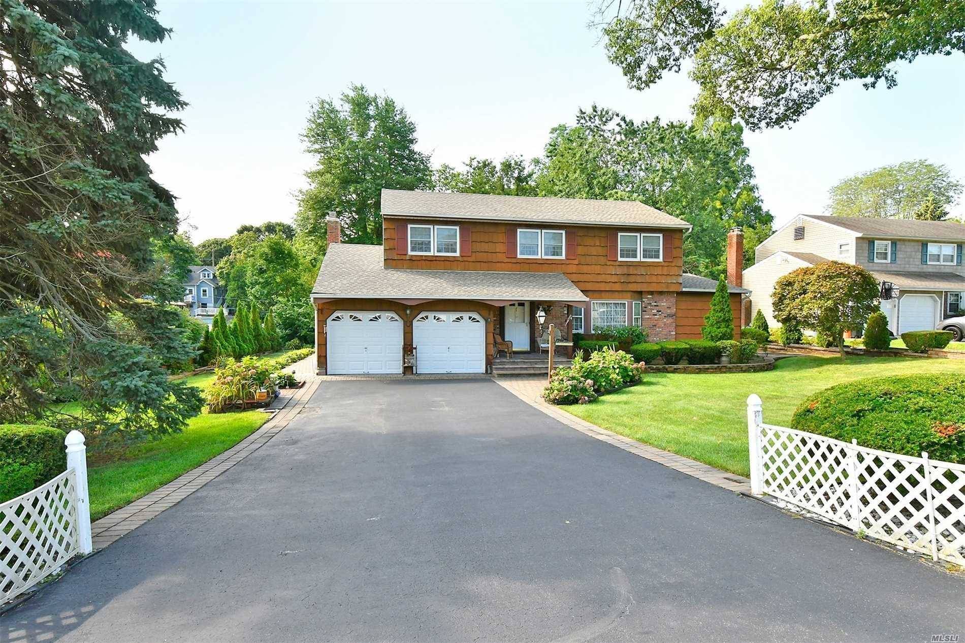 Well Maintained Expanded Colonial Located In A Wonderful Cul-De-Sac.