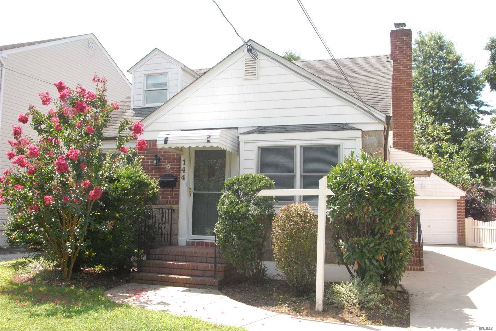Spacious Cape In Floral Park Village-Move Right In.