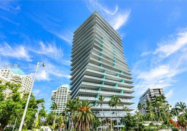 Live in this beautiful lower penthouse in the twisting towers on South Bayshore Drive
