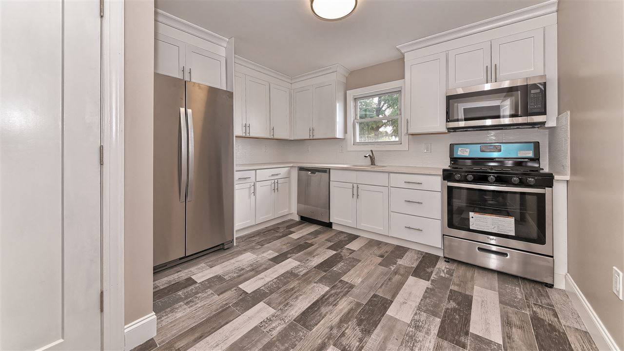 Welcome home to this completely renovated single family home located in the desirable area of Jersey City West Bergen