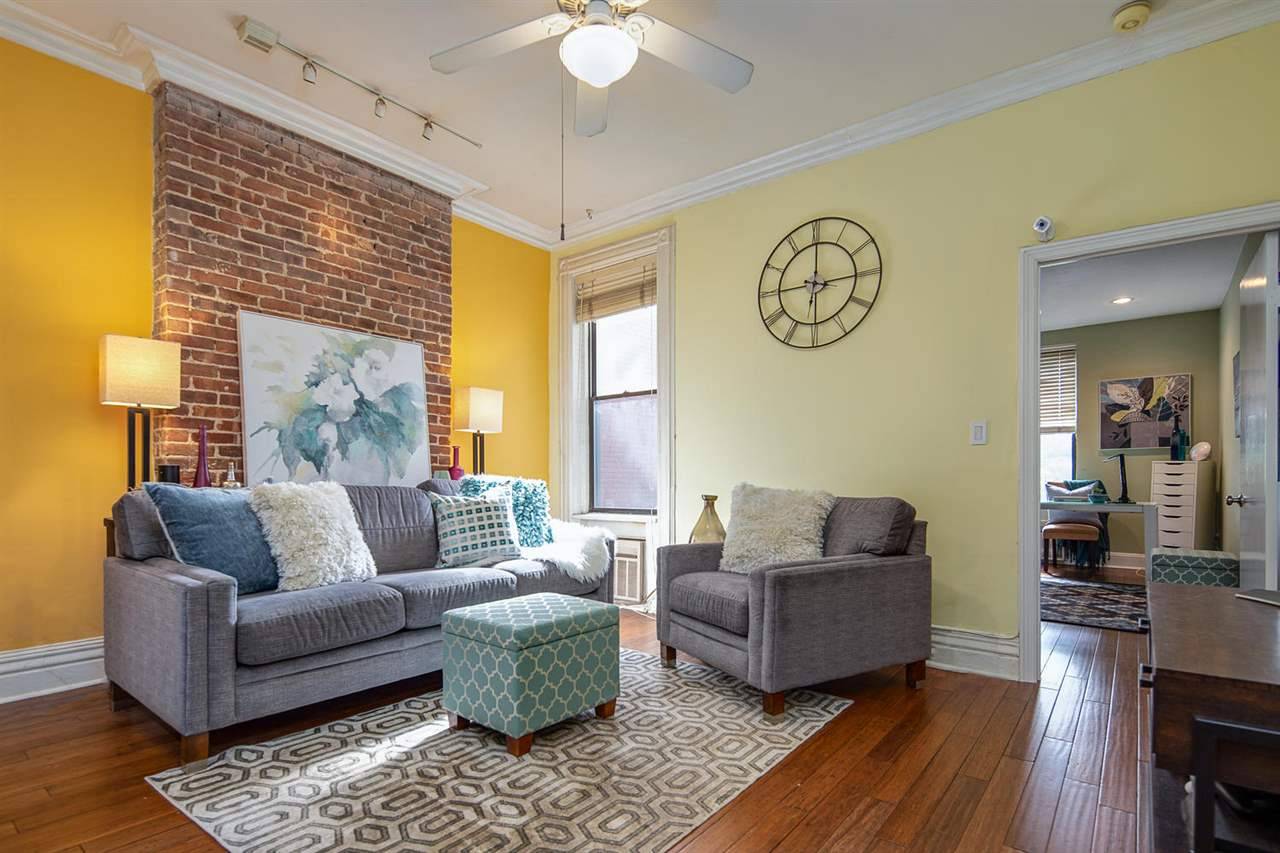 This greatly sought-after uptown Washington Street location offers a charming 2-bedroom condo with 10-foot ceilings