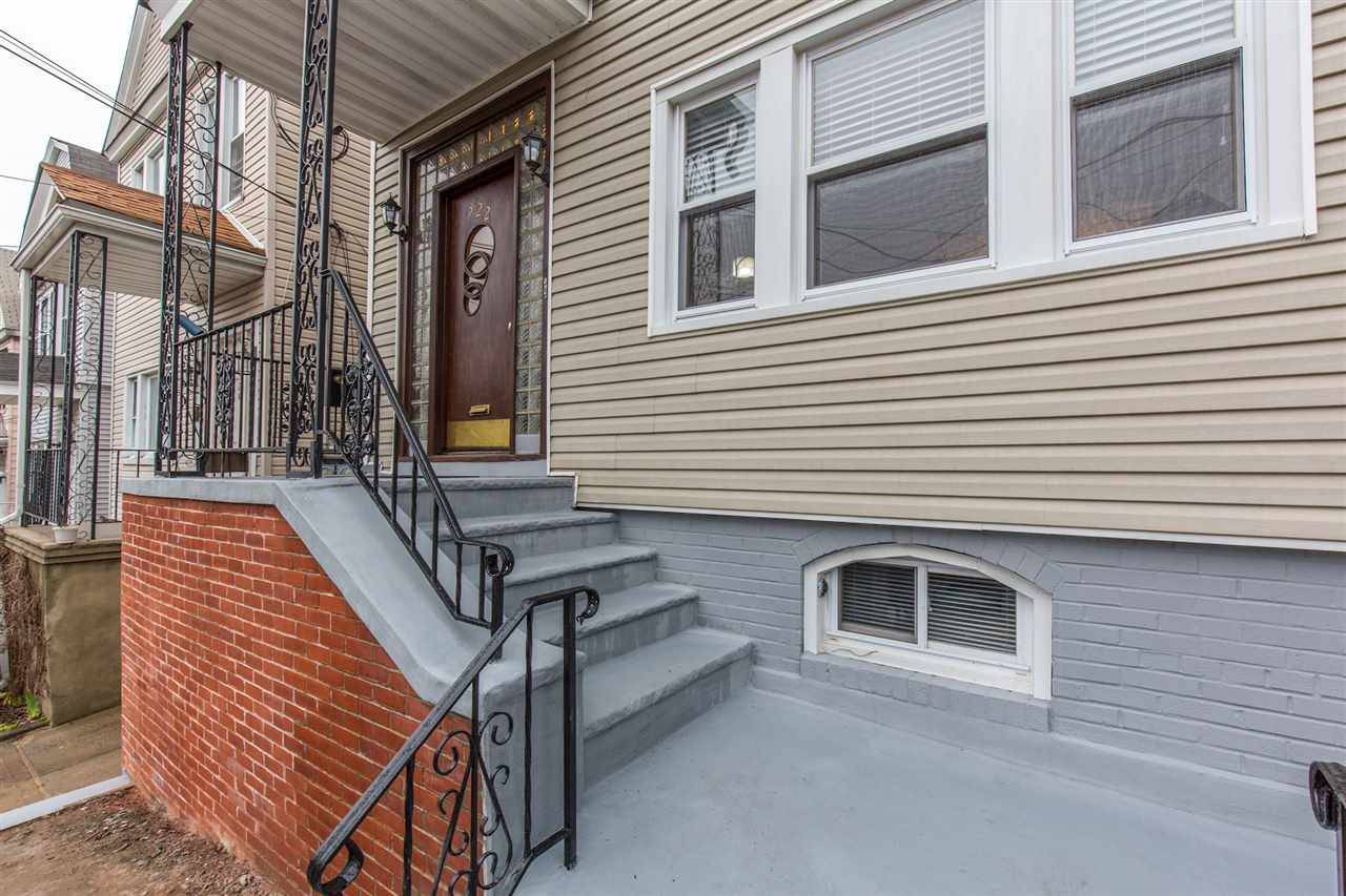 Welcome home to this sunlit & attractively updated home in Jersey City Height's sought after western slope neighborhood