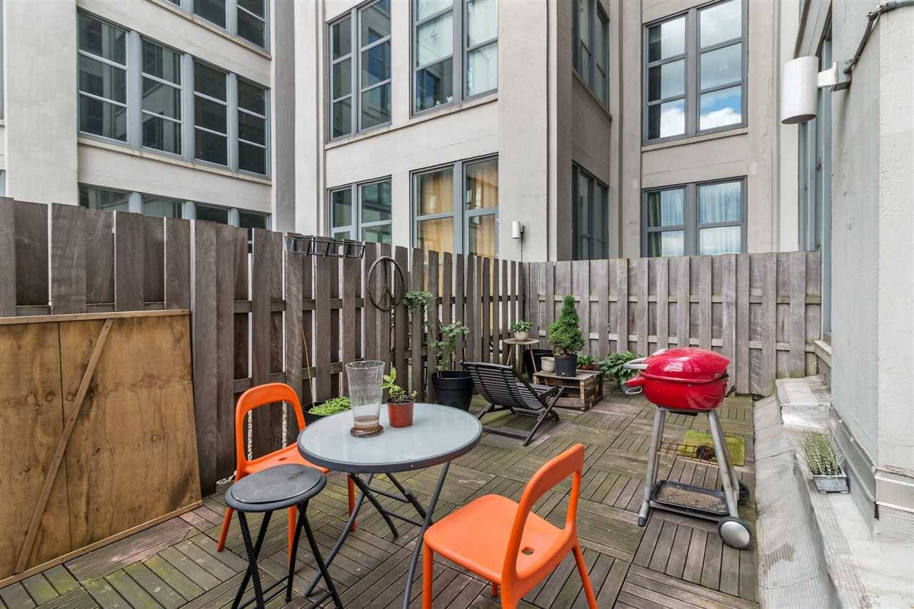 Artistic vision meets cutting edge modern style in this amazing 1 Bed + Den/2 baths & a Private Deck at CANCO Lofts
