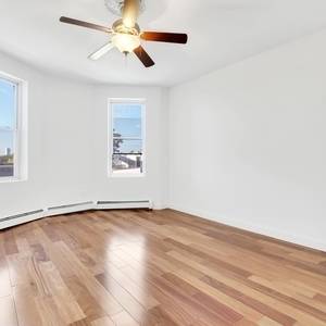 Newly Renovated 2 bedroom featuring brand new hardwood floors and a beautiful bathroom