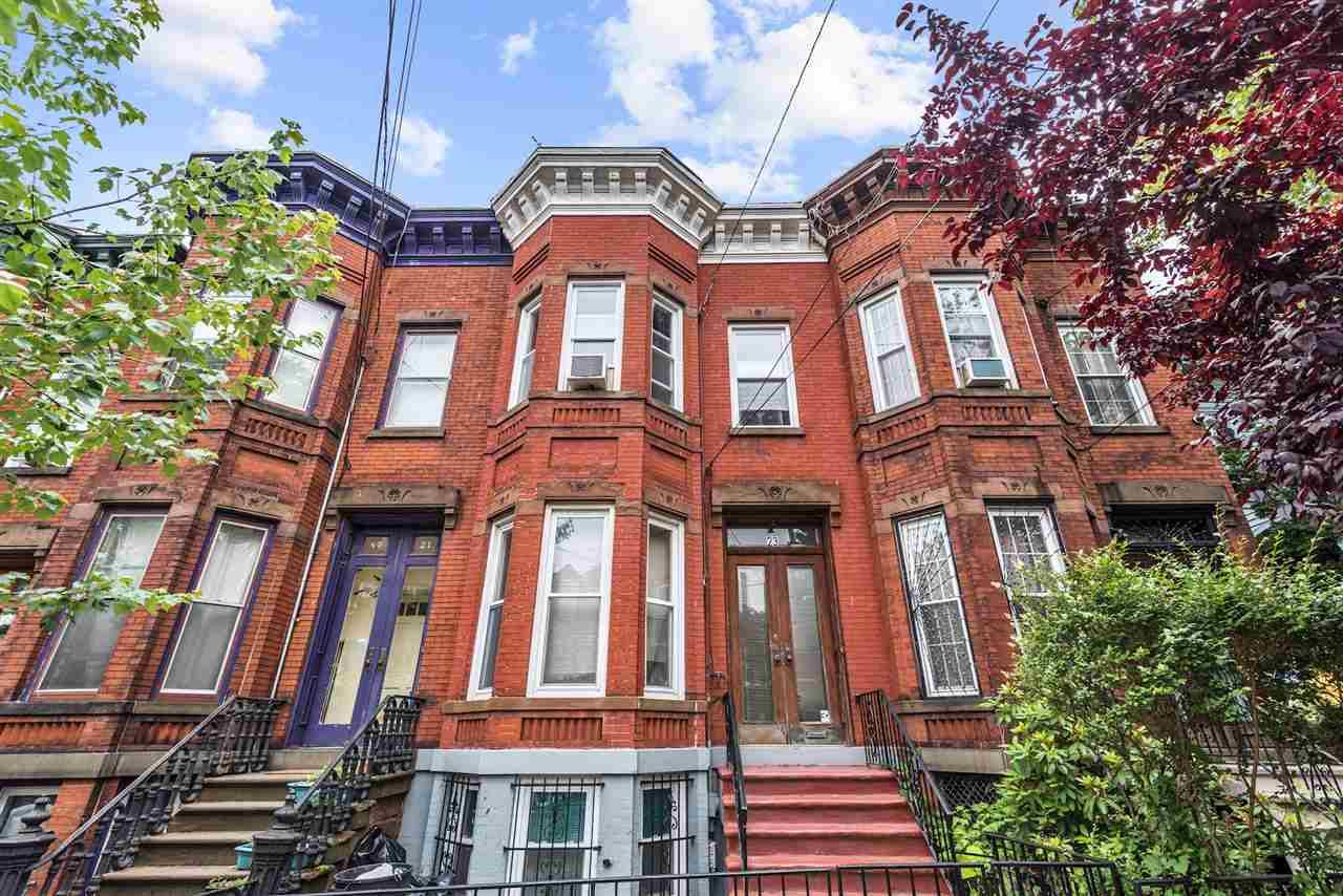 Welcome to this elegant Pre-War brick townhouse located in the McGinley Square neighborhood in Journal Square