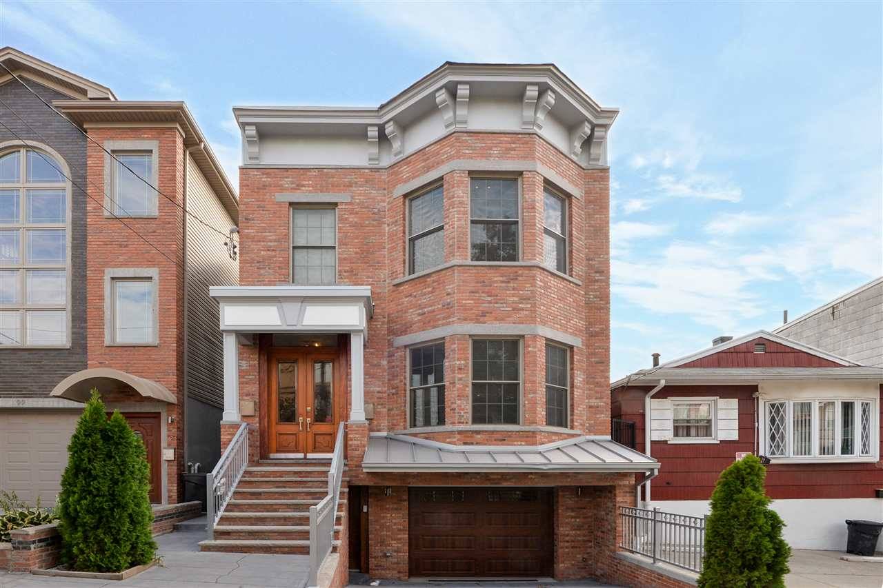 Sophisticated and newly renovated two family home on pretty block in Jersey City Heights