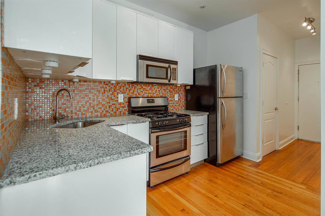 Beautifully renovated 2 bedroom corner unit located in the heart of Union City on the Weehawken border