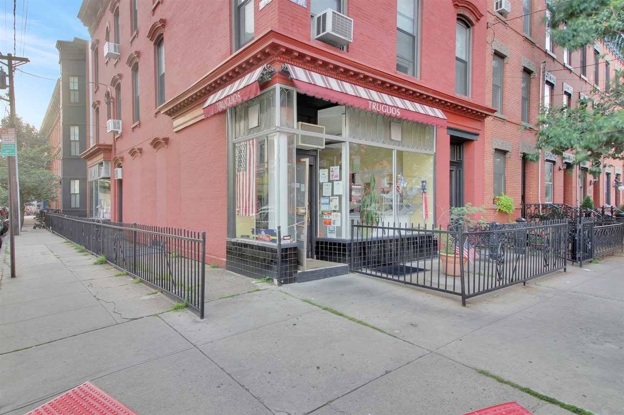 Beautiful brick building on a 25x68 corner lot located at a prime uptown Hoboken location