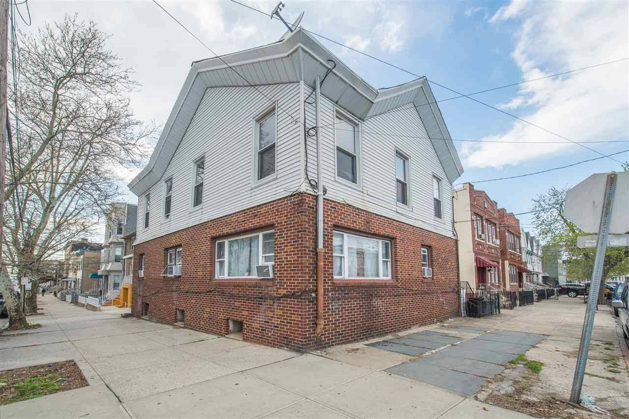 Welcome to 17 Milton Avenue a corner legal 3 family with 5 car parking in the heart of Jersey City Heights
