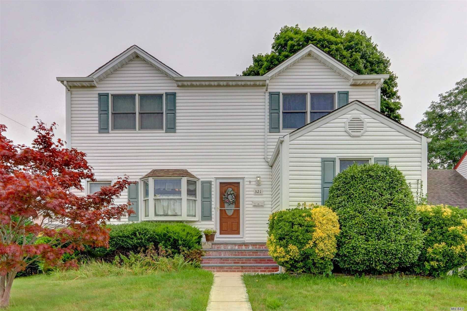 Bright & Sunny Colonial In Sd#23 Features Updated Roof, Siding, Andersen Windows.