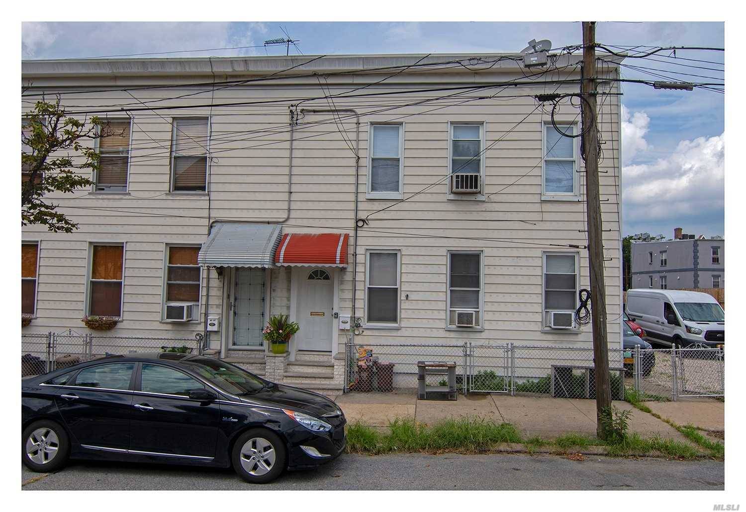 We Are Happy To Present This Lovely 2 Family Home In Maspeth!