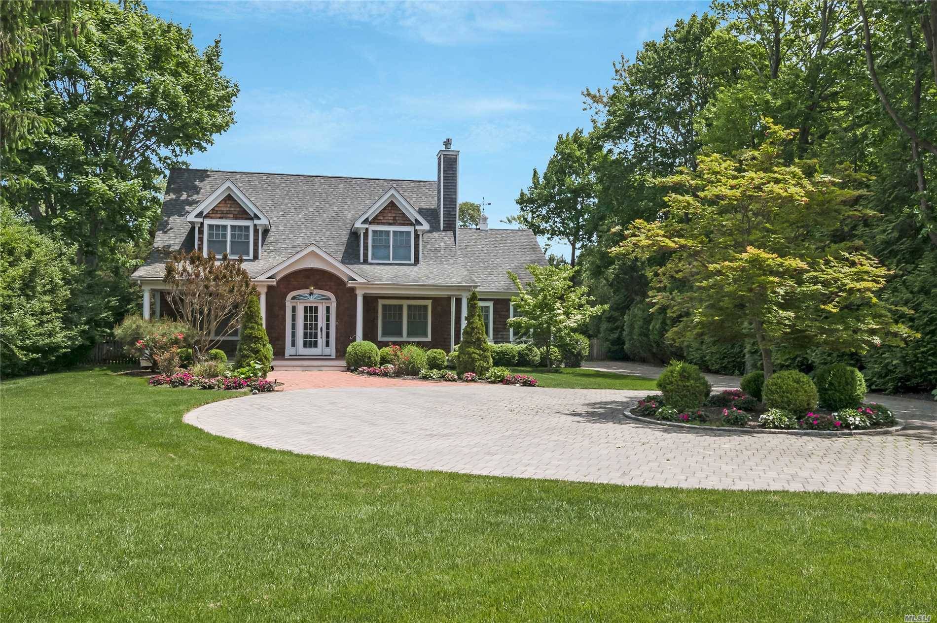 Beautifully Sited, Sizable Lot In The Heart Of Westhampton Beach Village, This Most Inviting 3 Br Home Is Hidden Behind Walls Of Lush Greenery.