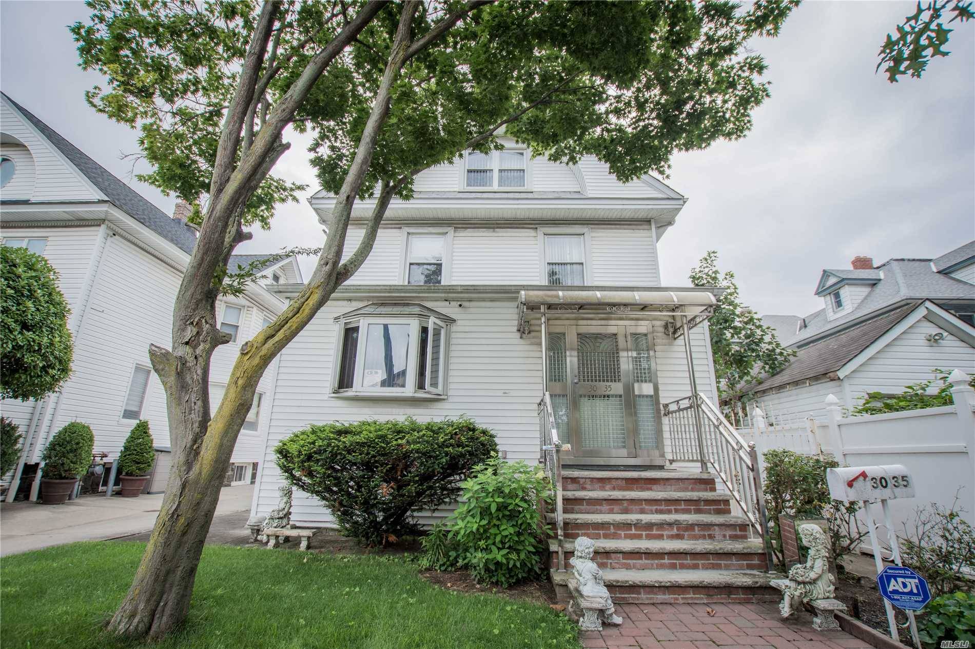 A Beautiful 6 Bedroom 3 Bath House Conveniently Located On A Quiet Residential Street In North Flushing.