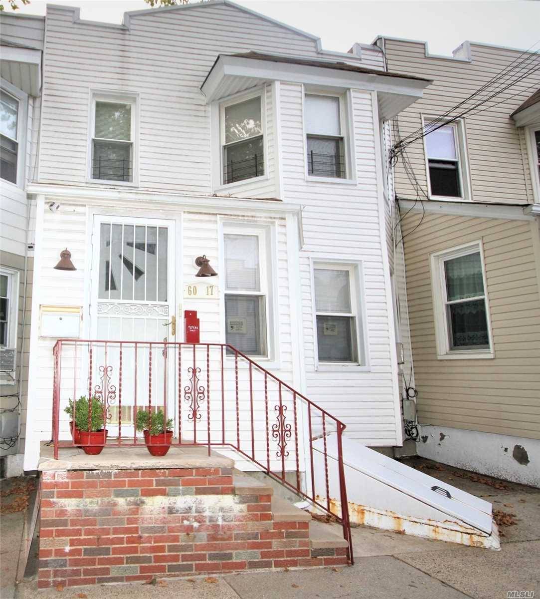Attached, 2-Family Frame, 2-Story Home Featuring A 3-Bedroom Apt Over A 2-Bedroom Apt Over A Full Finished Basement.