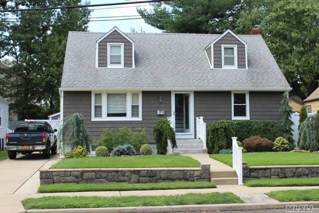 Well Maintained Rear Dormered Wide Line Cape In The Garden City South Section, Featuring New Siding, Pvc Fence And Alarms System.