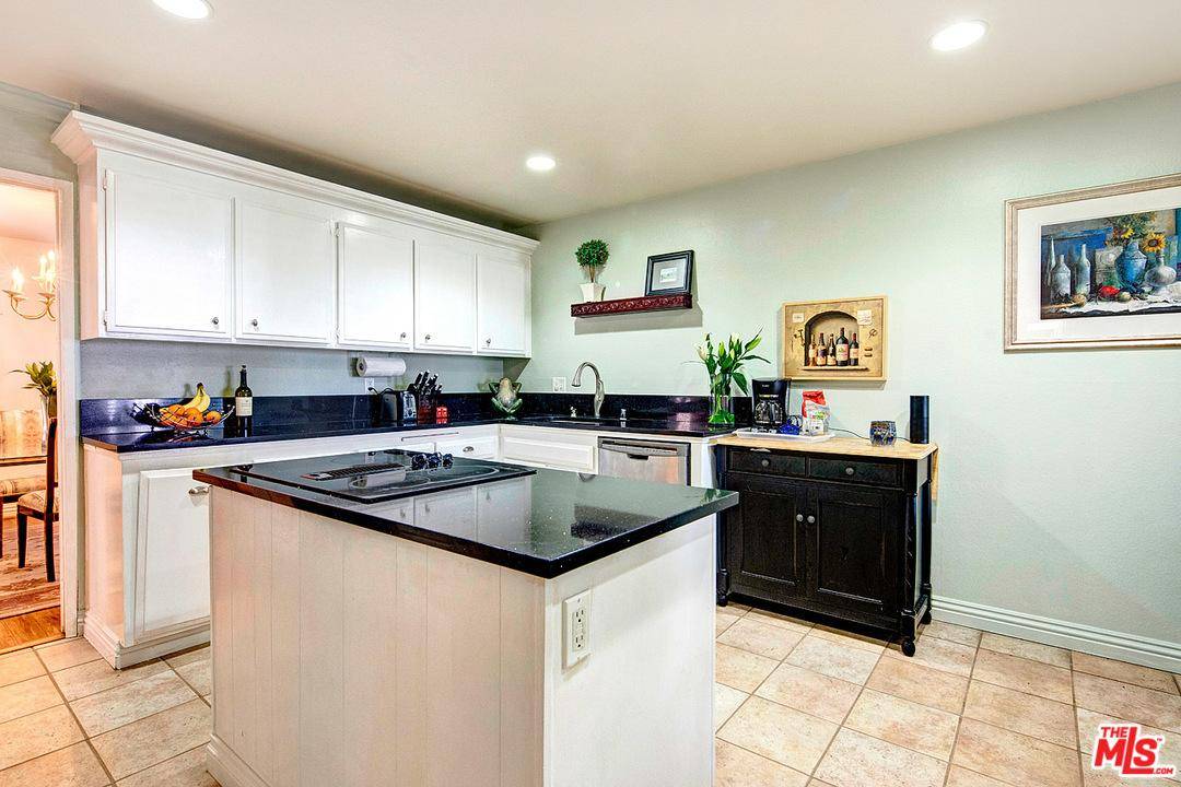 Tastefully remodeled 2bed/2bath condo just a short distance from the beach