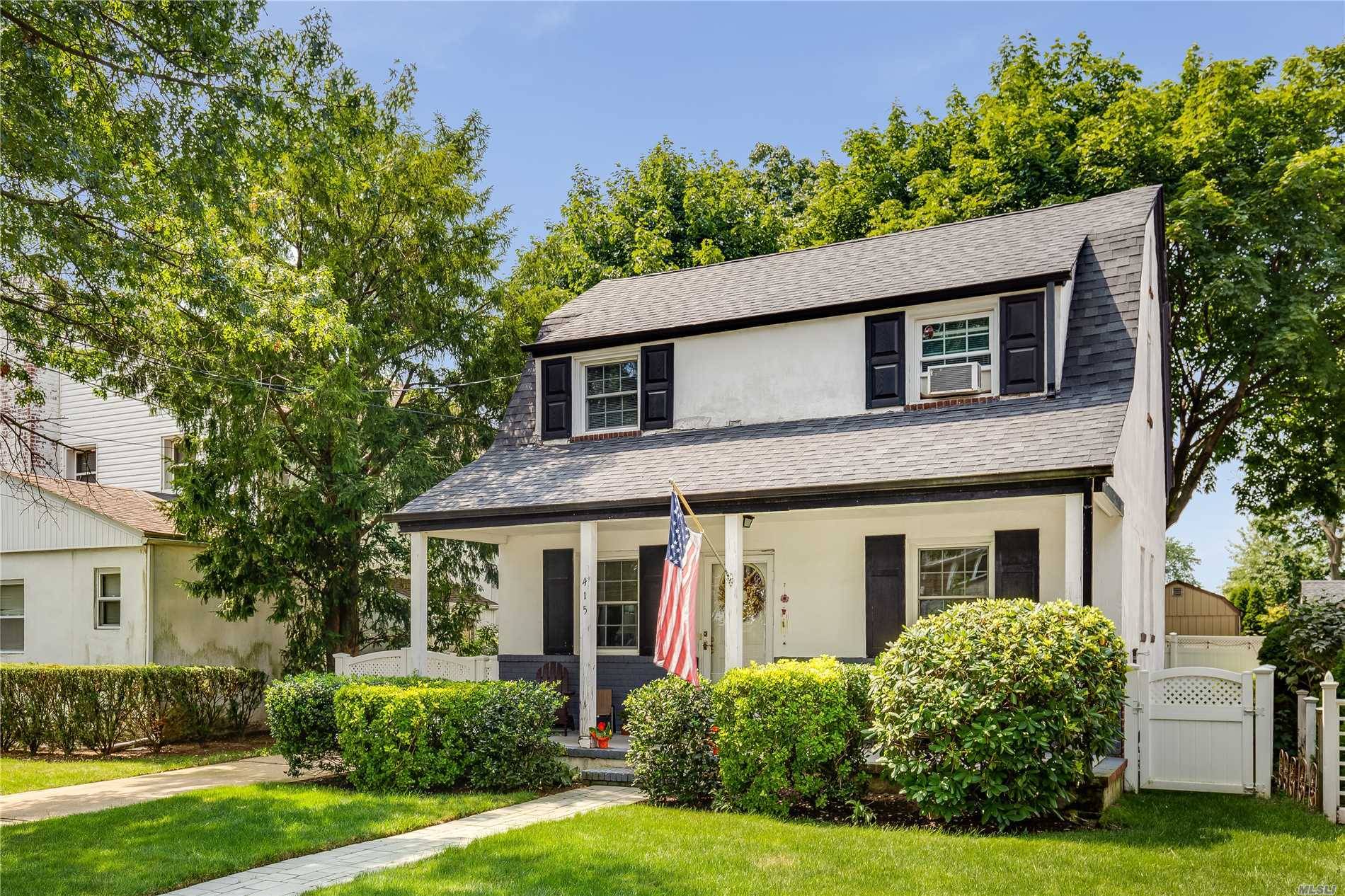 Lovely Colonial With Front Porch In The Heart Of New Hyde Park.
