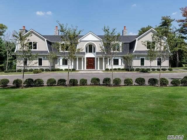 Majestically Situated On The North Shore Of Long Island In A Prestigious Gold Coast Village, This Sophisticated Home Sits On Level Park Like Grounds In A Tranquil Cul De Sac.