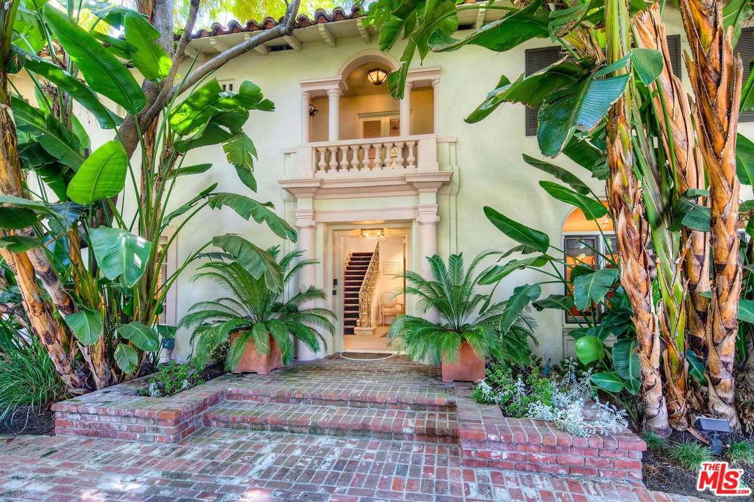 Rare opportunity to acquire an unspoiled 1922 Beverly Hills Spanish Estate in the heart of the Flat's