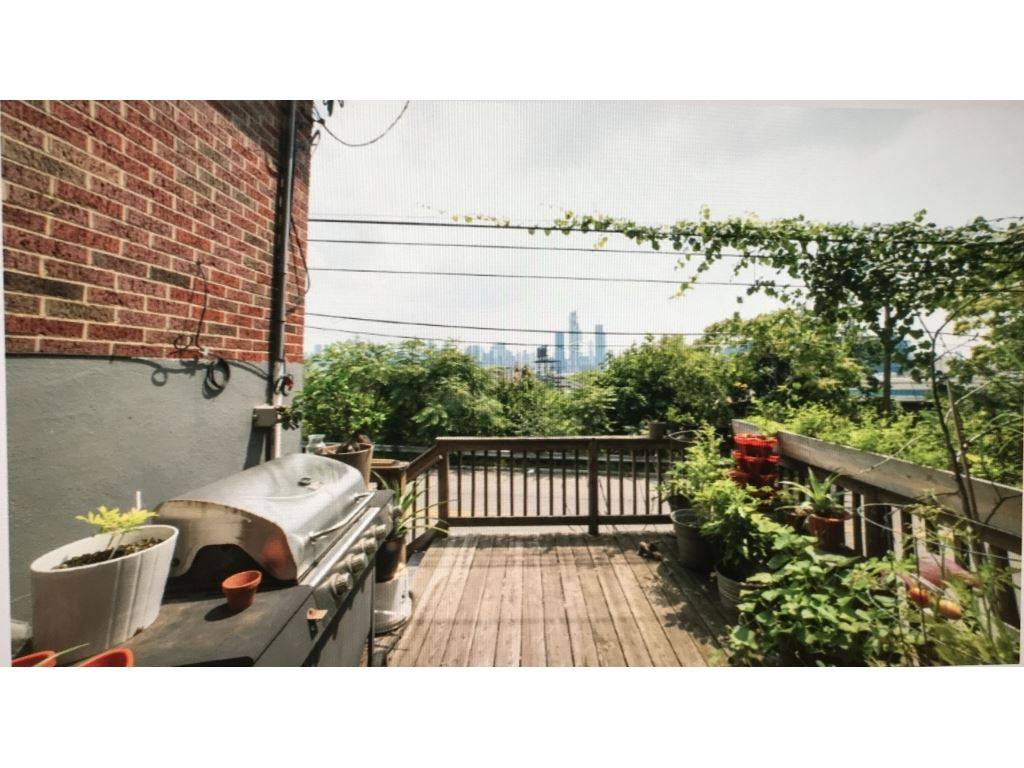 A most unique single-family residence just minutes from midtown Manhattan with indoor parking on a secluded private wooded hill in Weehawken