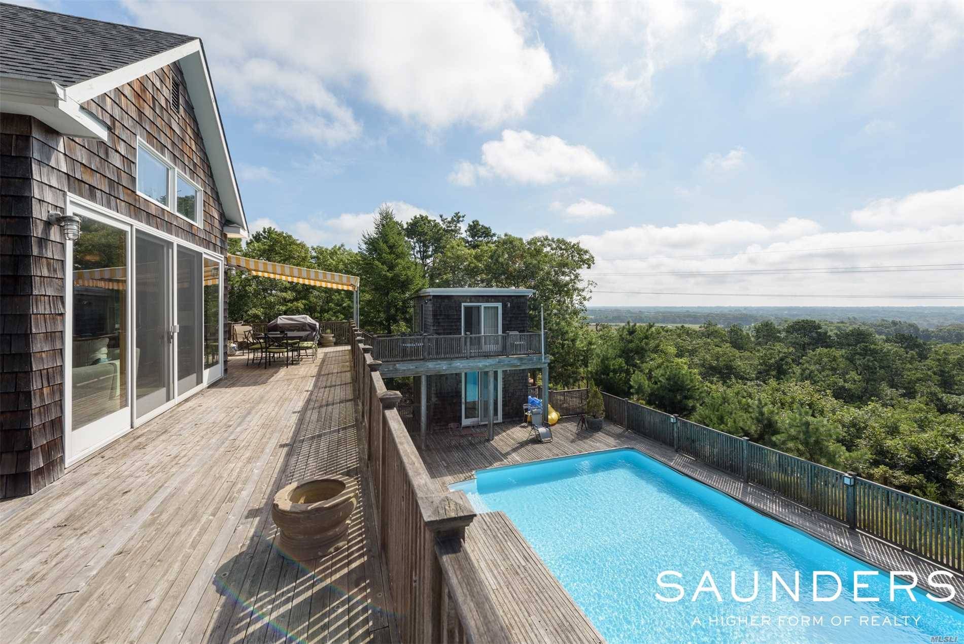 Set On One Of The Highest Points In The Hamptons, Overlooking Bridgehampton, Enjoy A Fabulous Scenic View Of Farmfields Stretching To The Atlantic Ocean.