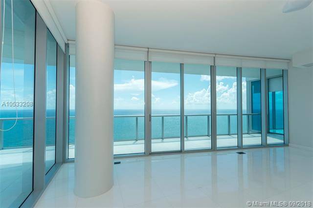 Gorgeous north unit with front ocean views and 180 degrees view to the bay and the city