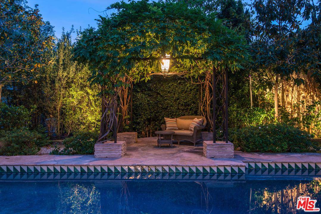 Sophisticated Tuscan Villa situated behind gates & located just minutes from the heart of Beverly Hills