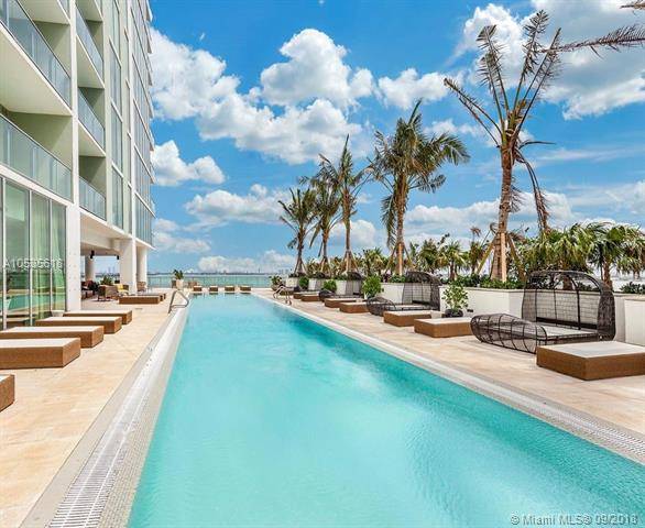 This stunning 3 bedrooms + den & 4 bathrooms corner residence at Biscayne Beach offers breath-taking views of the Atlantic ocean