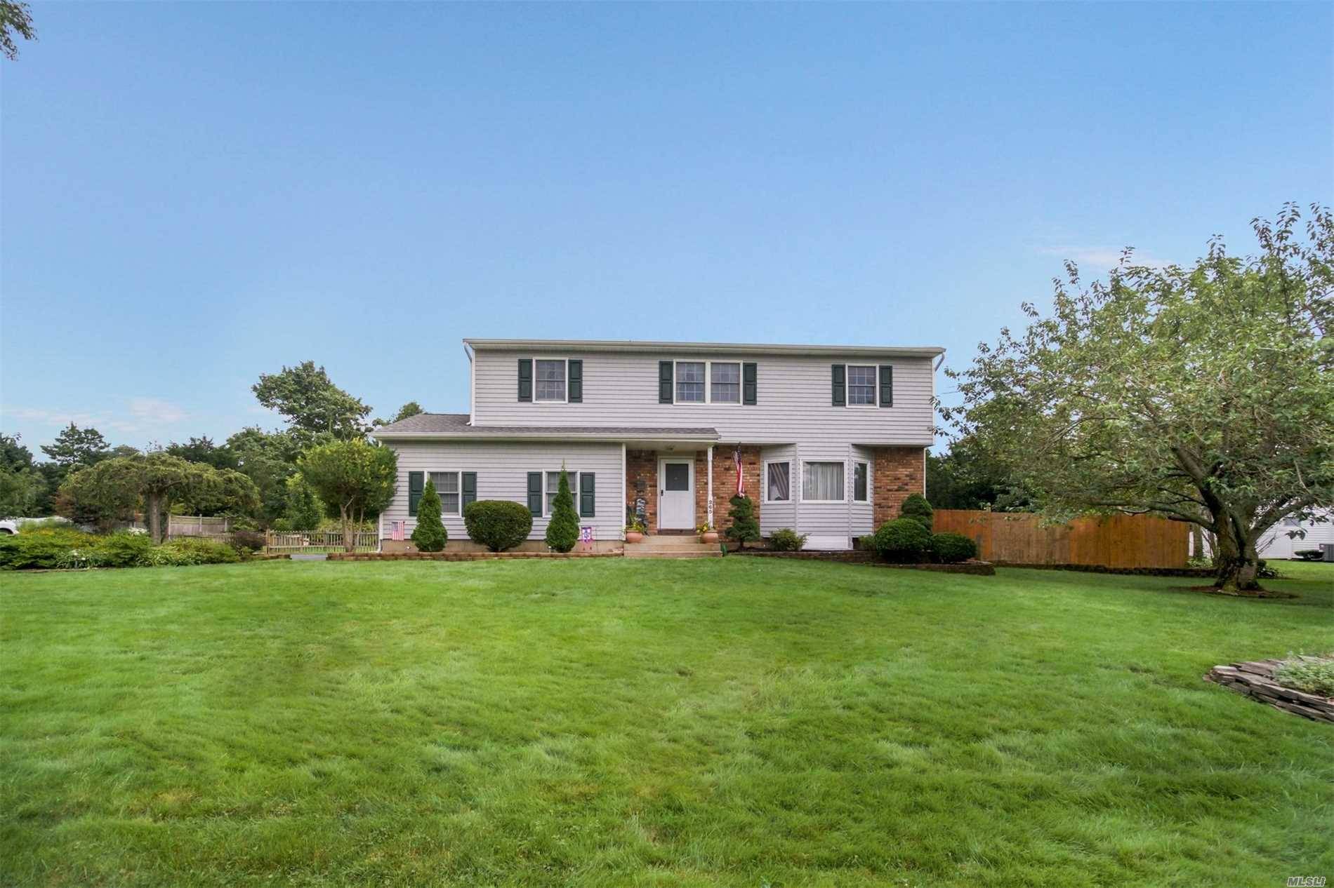 Incredibly Maintained And Pristine Side Hall Colonial Sited On A Beautifully Manicured 1/2 Acre.