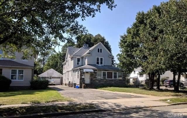 Large Colonial Style Home, Quiet Mid-Block Location W/ Some Nice Curb Appeal, Situated On A Great Sized Property.