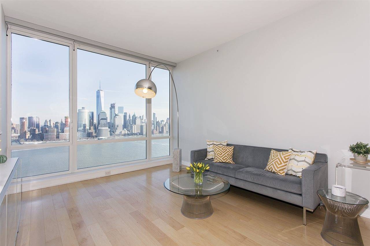 Enjoy incredible direct NYC views from this fully-furnished 1BD/1