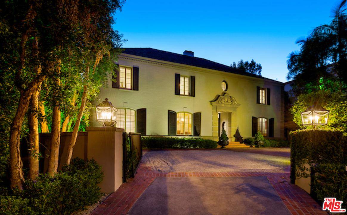 A chic French furnished contemporary home perfectly situated on one of Beverly Hills most beautiful streets